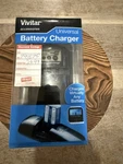 New Vivitar VIV-SC-4200B Universal Lcd Charger With Usb. Fixed Price $13.10.