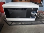 Sunbeam SGS10701 0.7-CU Ft 700-WATT Countertop Microwave (white). Fixed Price $39.99.